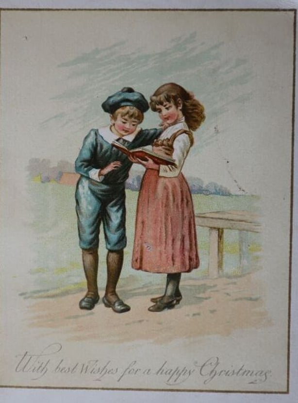 A vintage card with the words 'With Wishes for a Happy Christmas'