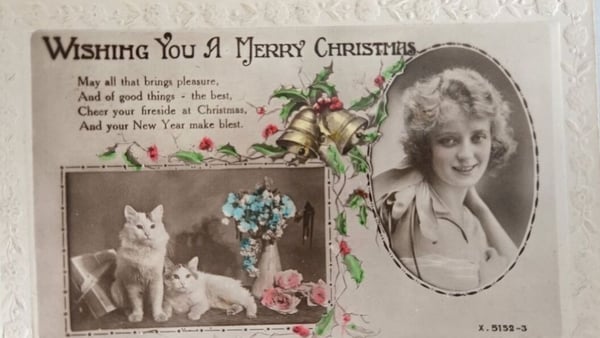 A vintage card with the words 'Wishing You A Merry Christmas'