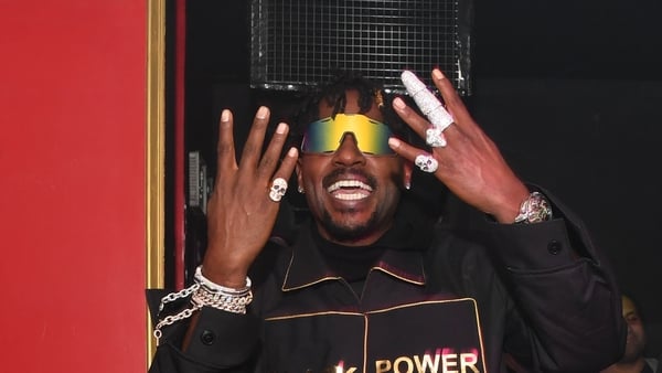 Antonio Brown and guests attend Friday's at Red Martini Restaurant and Lounge on February 3, 2023 in Atlanta, Georgia.(Photo by Prince Williams/Wireimage)