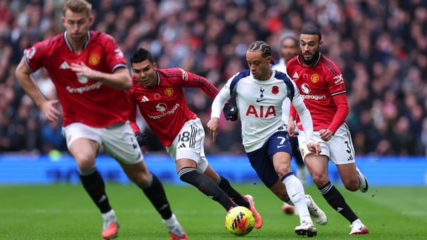 Xavi Simons of Tottenham Hotspur under pressure from Noussair Mazraoui and Casemiro of Manchester United during the Premier League match between Tottenham Hotspur and Manchester United at Tottenham Hotspur Stadium on November 8, 2025 in London, England. (