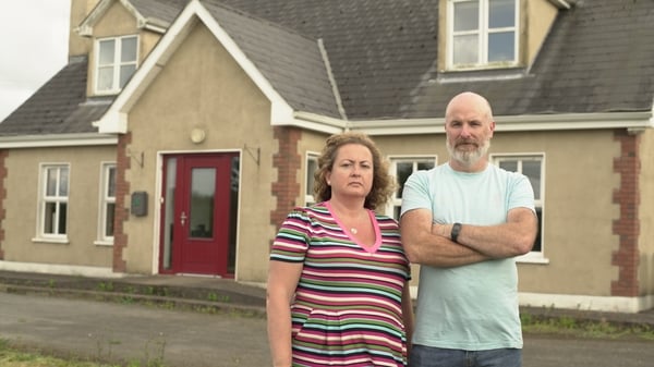 Sonia and Michael Grace are pictured outside their home