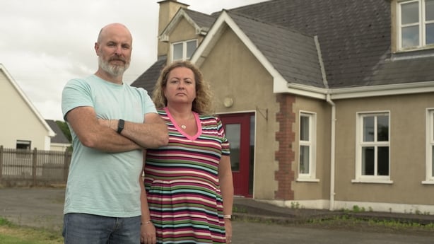 Sonia and Michael Grace are pictured outside their home