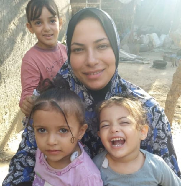 Amna Rizq and daughters Eileen, Lena and Lana