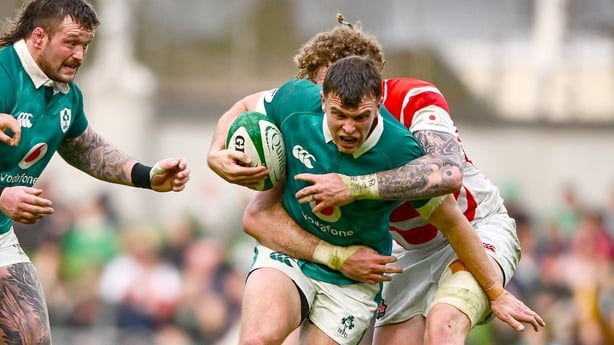 8 November 2025; Tom Farrell of Ireland is tackled by Warner Dearns of Japan during the Quilter Nations Series 2025 match between Ireland and Japan at the Aviva Stadium in Dublin. Photo by Shauna Clinton/Sportsfile
