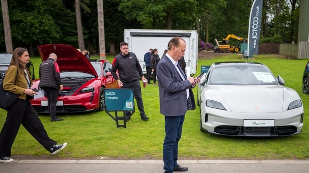 Motoring journalist and transport campaigner Quentin Willson checks his phone on the first day of the Everything Electric North Show on 24 May, 2024 in Harrogate