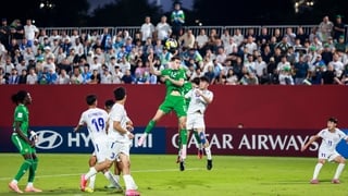 8 November 2025; Ryan Butler of Republic of Ireland in action against Abdulmalik Anvarov of Uzbekistan during the FIFA Under-17 World Cup Group J match between Republic of Ireland and Uzbekistan at Aspire Zone in Doha, Qatar. Photo by Nikola Krstic/Sports