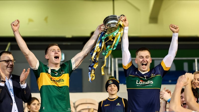 Clonmel captain Séamus Kennedy (L) lifts the O'Dwyer Cup alongside Shane Ryan