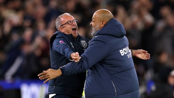 West Ham manager Nuno Espirito Santo (R) celebrates with first team coach Mark Robson after their side's third goal