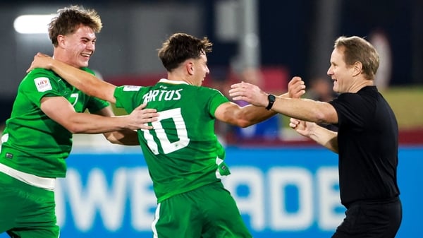 Republic of Ireland players Grady McDonnell, left, and Ramon Martos celebrate with head coach Colin O'Brien at the full-time whistle