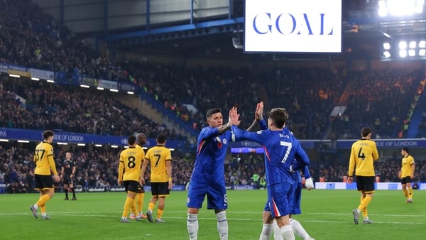 Chelsea's Enzo Fernandez, Pedro Neto and Alejandro Garnacho celebrate their opening goal against Wolves
