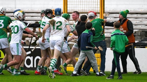 9 November 2025; Players from both sides jostle, as a supporter, 3 from right, joins in the afray, after the AIB Leinster GAA Hurling Senior Club Championship quarter-final match between Shamrocks Ballyhale and Kilcormac-Killoughey at UMPC Nowlan Park in Kilkenny. Photo by Ray McManus/Sportsfile