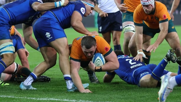 UDINE, ITALY - NOVEMBER 08: Angus Bell of Australia scores his team's second try during the Quilter Nations Series 2025 match between Italy and Australia at Stadio Friuli on November 08, 2025 in Udine, Italy. (Photo by Timothy Rogers/Getty Images)