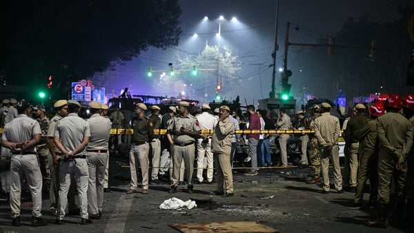 Security personnel cordon off the blast site after an explosion near the Red Fort in New Delhi