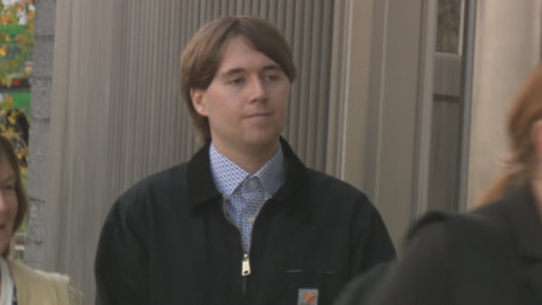 Still image of Denis Morris entering the courthouse