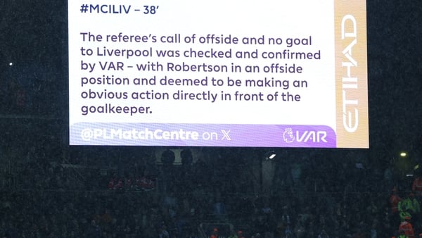 The electronic board displays the VAR decision to confirm the offisde ruling out the goal by Liverpool's Dutch defender #04 Virgil van Dijk during the English Premier League football match between Manchester City and Liverpool at the Etihad Stadium in Man