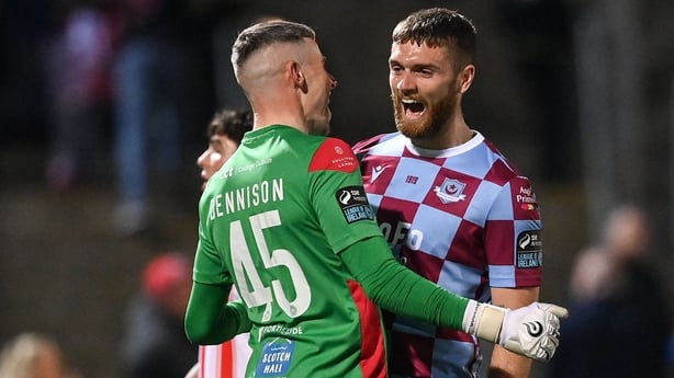 Drogheda United's Conor Keeley and goalkeeper Luke Dennison celebrate after the SSE Airtricity Men's Premier Division match between Derry City and Drogheda United at The Ryan McBride Brandywell Stadium in Derry.