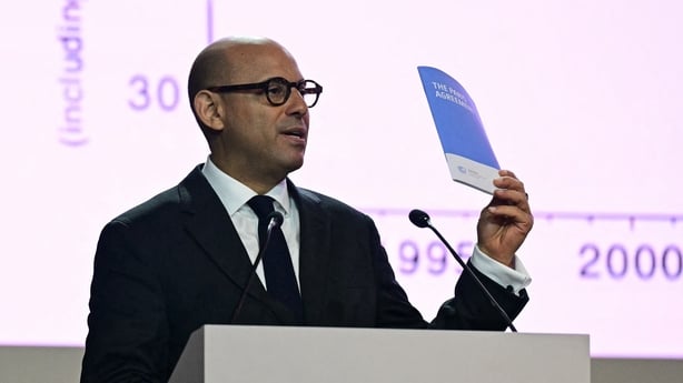 Simon Stiell delivers a speech during COP30