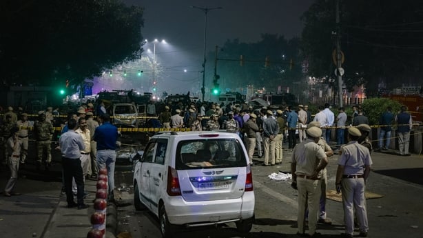 Members of the emergency services at the blast site