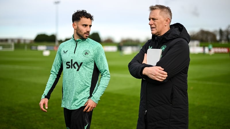 Kevin O'Toole chatting to Heimir Hallgrimsson while training on Monday
