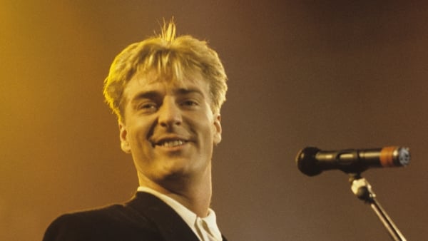 Richard Darbyshire of Living in a Box performs on stage in 1989