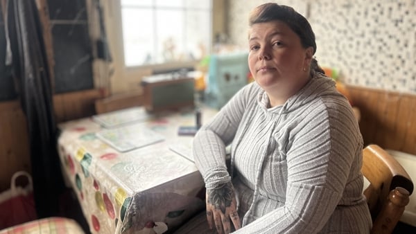 A photo of Samantha Sheehy sitting at a table