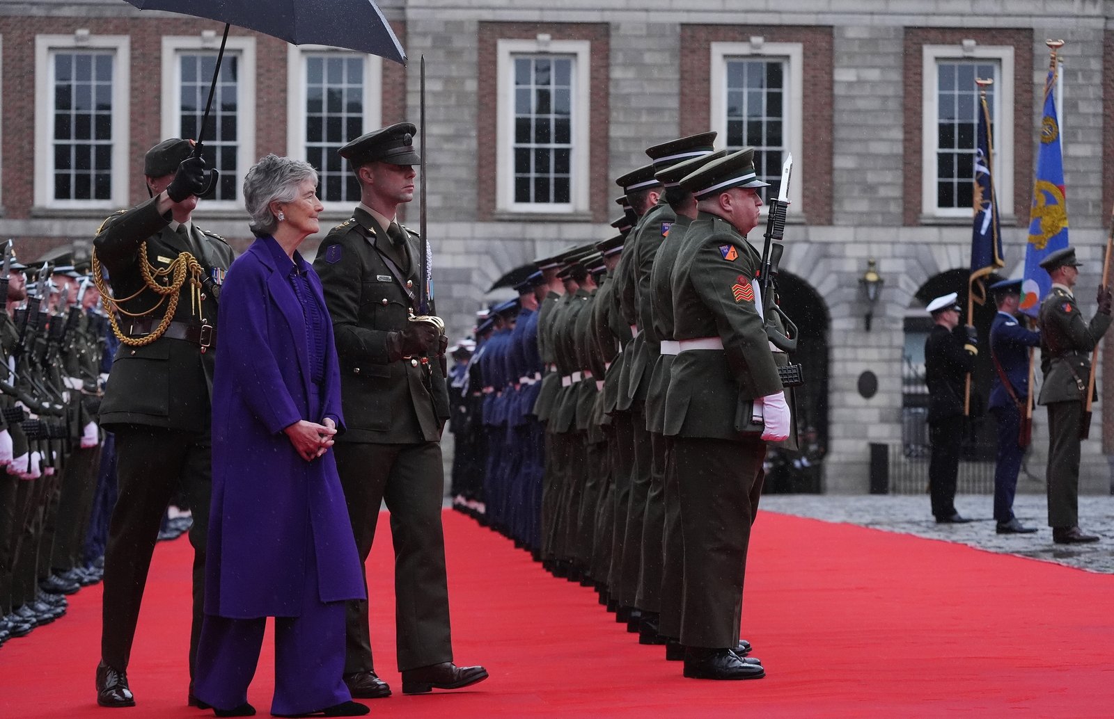 The new Supreme Commander of the Defence Forces carried out an inspection of the Guard of Honour. Pictures from GIS, Getty and PA