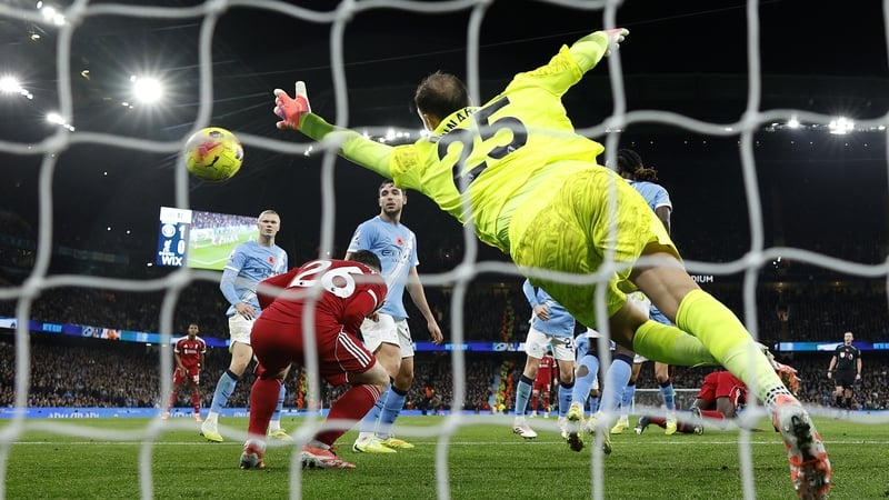 Andrew Robertson ducked as his Liverpool team-mate Virgil van Dijk's header was on its way to the net
