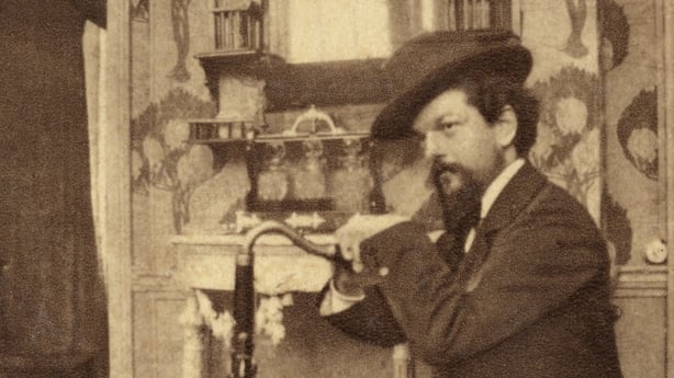 Claude Debussy, 1862-1918. French composer. Photographed in 1909. Paris, Fondation Napoleon. (Photo by: Photo12/Fondation Napoleon/Universal Images Group via Getty Images)