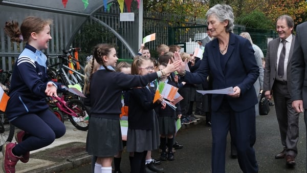 President Catherine Connolly greets children during a visit to Gaelscoil Inse Chór in Inchicore