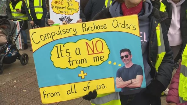 A sign is seen during a protest outside leinster house 