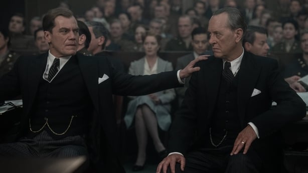 Michael Shannon as Robert H Jackson and Richard E Grant as David Maxwell Fyfe in a courtroom scene in Nuremberg