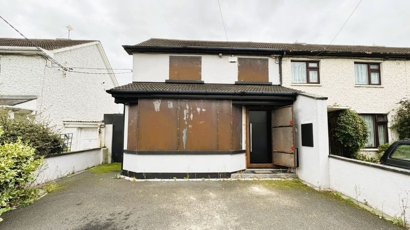 The house was badly damaged when CAB seized it and it was boarded up