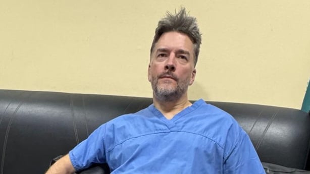  Dr Morgan McMonagle in his scrubs in a hospital in Gaza