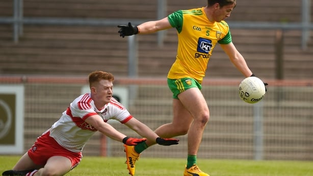 3 June 2018; Peadar Mogan of Donegal in action against Jude McAtamney of Derry during the Eirgrid Ulster GAA Football U20 Championship Quarter Final match between Derry and Donegal at Healy Park in Omagh, Co Tyrone. Photo by Philip Fitzpatrick/Sportsfile