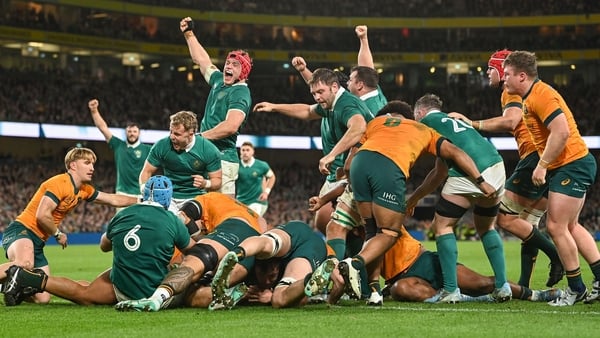 30 November 2024; Ireland players celebrate as teammate Gus McCarthy, partially hidden, scores their side's third try during the Autumn Nations Series match between Ireland and Australia at the Aviva Stadium in Dublin. Photo by Ramsey Cardy/Sportsfile