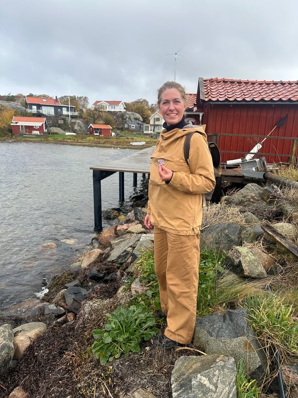 A woman overlooking a sea