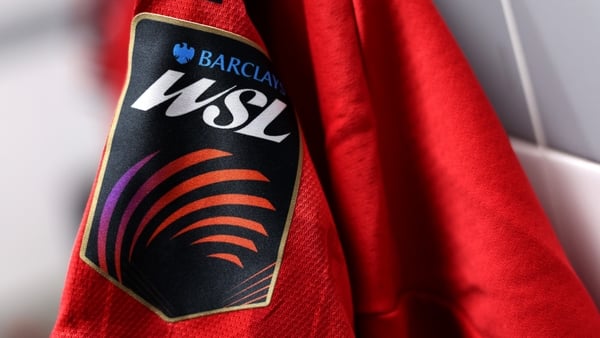 A detailed view of the Barclays WSL logo on the sleeve of a match shirt in the Manchester United dressing room prior to the Barclays Women's Super League match between Manchester United and Aston Villa at Progress with the Unity Stadium on November 08, 20