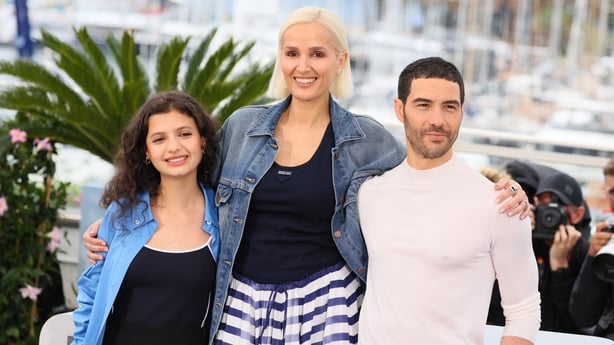 (L-R) Mélissa Boros, Julia Ducournau, and Tahar Rahim at the Alpha photocall at the 78th annual Cannes Film Festival at the Palais des Festivals et des Congrès on 20 May, 2025 in Cannes