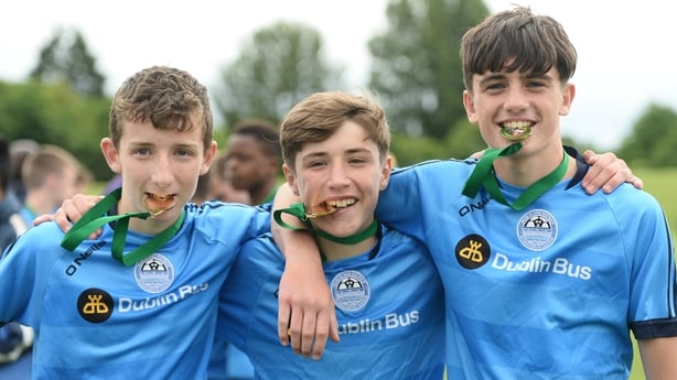 17 June 2016; DDSL players Brandon Holt, Alex Dunne and Troy Parrott, all of Belvedere FC, celebrate with their medals after defeating Galway in a penalty shootout AET in the SFAI Kennedy Cup Final at University of Limerick in Limerick. Photo by Diarmuid Greene/Sportsfile