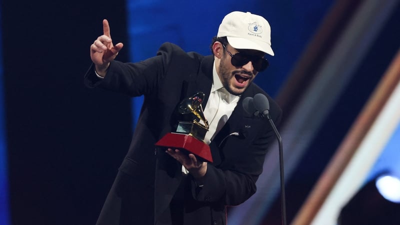 Puerto Rican singer Bad Bunny accepts the Album of the Year award at the Latin Grammys in Las Vegas