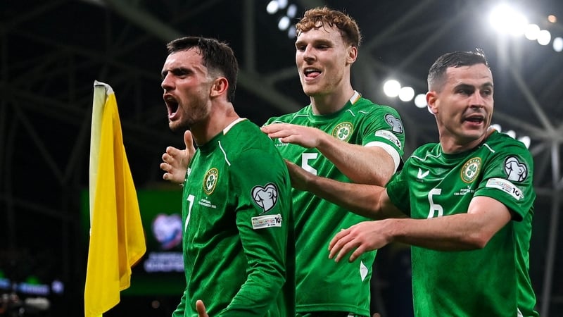 Troy Parrott, Jake O'Brien and Josh Cullen celebrate Ireland's second goal against Portugal
