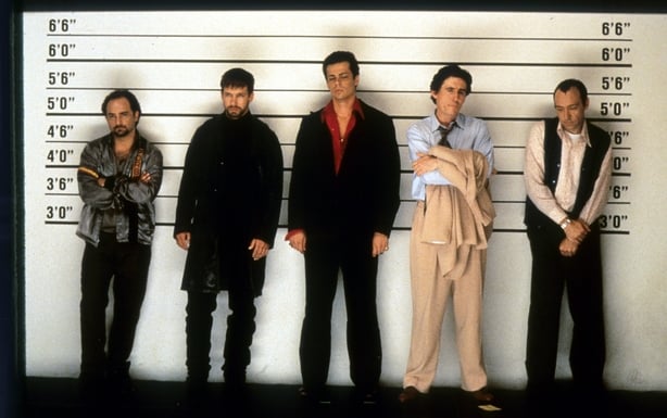 Kevin Pollak, Stephen Baldwin, Benicio Del Toro, Gabriel Byrne and Kevin Spacey line up in a scene from the film 'The Usual Suspects', 1995. (Photo by Gramercy Pictures/Getty Images)