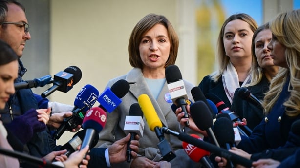 Moldova's President and candidate Maia Sandu addresses media after she casted her vote for the presidential election