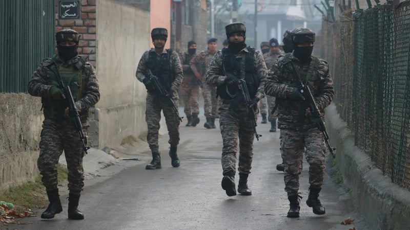 Indian security forces patrolling near the Nowgam police station after the explosion