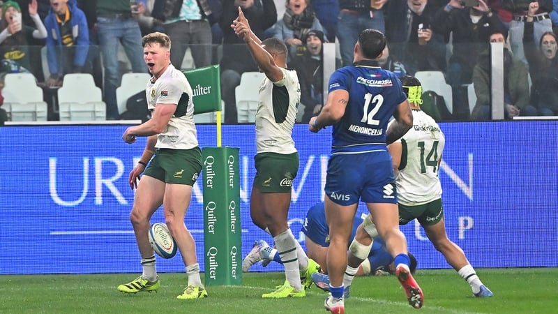 Ethan Hooker celebrates after scoring the final try of the afternoon for South Africa
