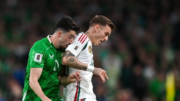 Bendegúz Bolla of Hungary is tackled by Finn Azaz of Republic of Ireland during the FIFA World Cup 2026 Group F qualifying match between Republic of Ireland and Hungary at the Aviva Stadium in Dublin
