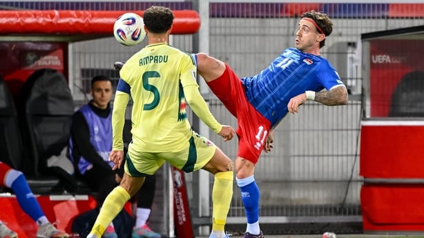 Ethan Ampadu of Wales and Dennis Salanovic of Liechtenstein battle for the ball during the FIFA World Cup 2026 qualifier match between Liechtenstein and Wales at Rheinpark Stadion on November 15, 2025 in Vaduz, Liechtenstein.