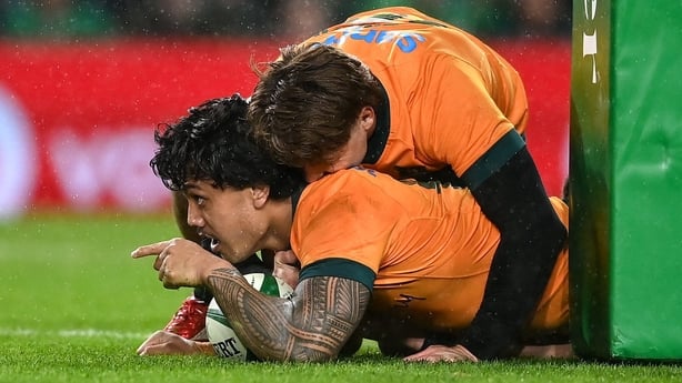 15 November 2025; Len Ikitau of Australia scores his side's first try as team-mate Max Jorgensen celebrates during the Quilter Nations Series 2025 match between Ireland and Australia at the Aviva Stadium in Dublin. Photo by David Fitzgerald/Sportsfile