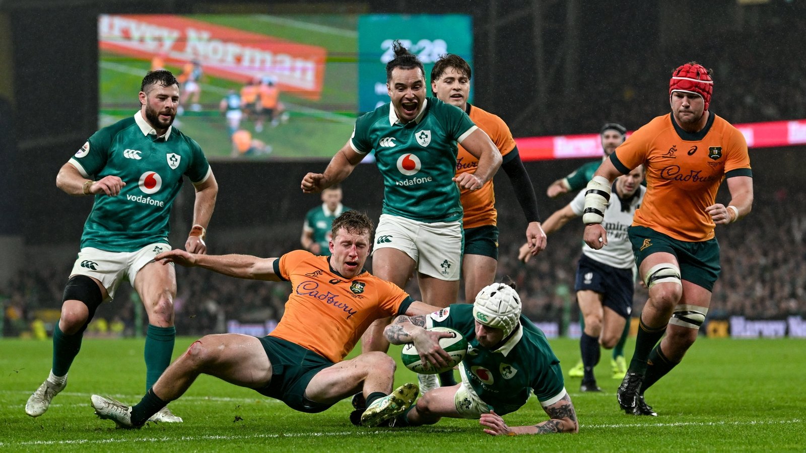 Hansen hits hat-trick as Ireland rout Australia