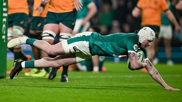 15 November 2025; Mack Hansen of Ireland scores his side's first try during the Quilter Nations Series 2025 match between Ireland and Australia at the Aviva Stadium in Dublin. Photo by Ramsey Cardy/Sportsfile